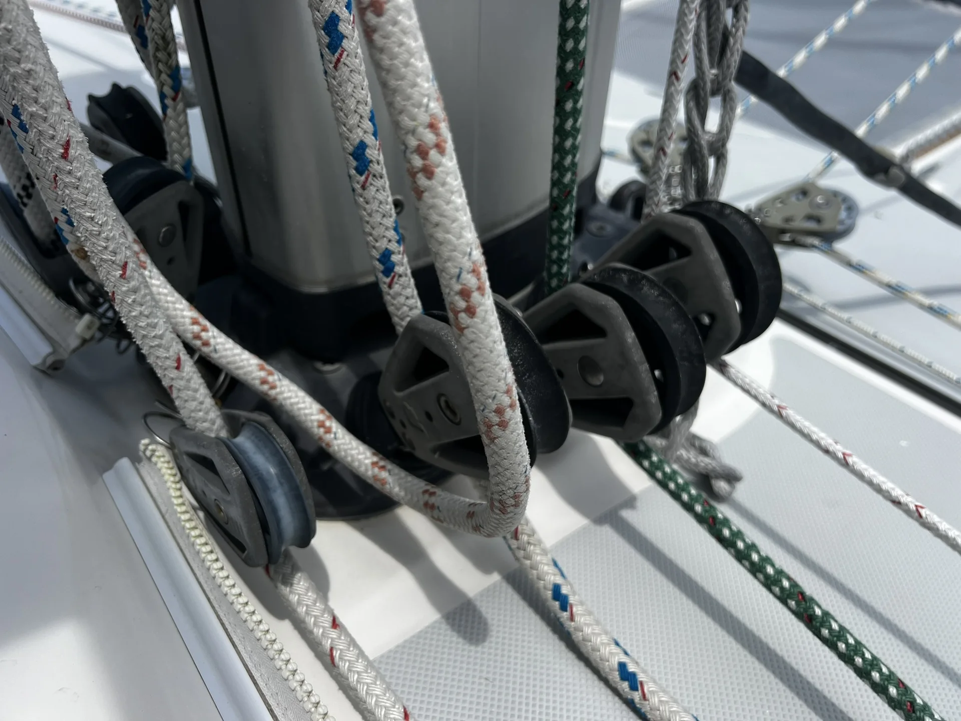 Sailboat turning blocks and running rigging at the base of a mast